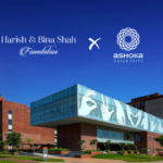 Modern campus building with glass facade, brick walls